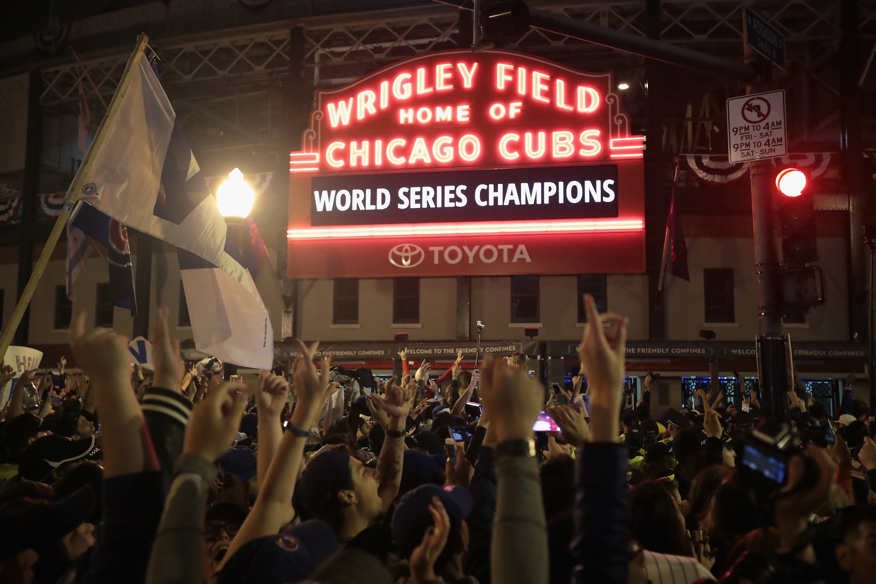 Cubs fans celebrate outside of Wrigley Field / photo by Scott Olson/Getty Images
