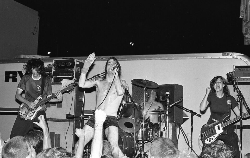 Edward Colver - My Wasted Youth Flip photograph of skateboarder/Punk  Chuck Burke stage diving, taken during a DOA, Adolescents & Stiff Little  Fingers show at Perkins Palace, Pasadena, Ca. July 4th 1981.