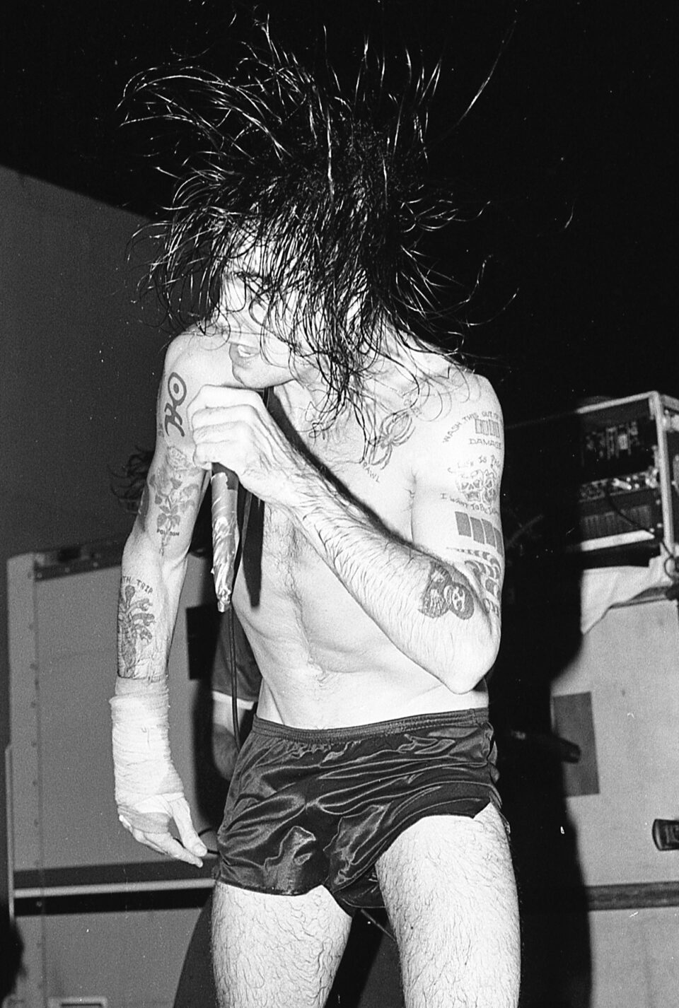 Edward Colver - My Wasted Youth Flip photograph of skateboarder/Punk  Chuck Burke stage diving, taken during a DOA, Adolescents & Stiff Little  Fingers show at Perkins Palace, Pasadena, Ca. July 4th 1981.