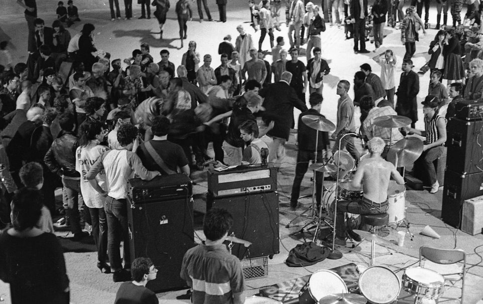 Edward Colver - My Wasted Youth Flip photograph of skateboarder/Punk  Chuck Burke stage diving, taken during a DOA, Adolescents & Stiff Little  Fingers show at Perkins Palace, Pasadena, Ca. July 4th 1981.